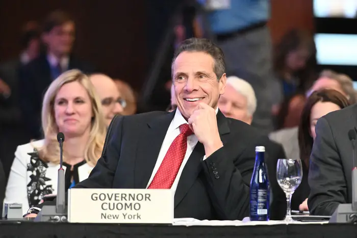 Cuomo at a conference